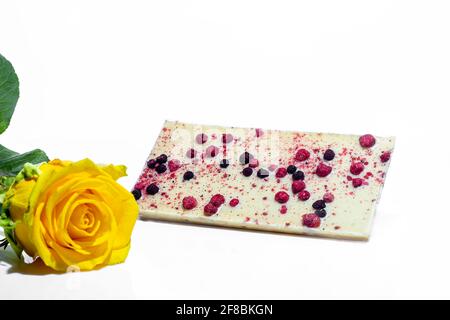 Chocolate bar with fruits on a white background. Gift concept. Isolate. Copy space. Stock Photo