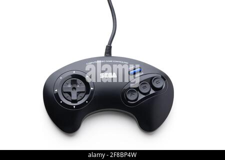 Varna, Bulgaria, 30 Mart 2021: Sega Mega Drive 16-bit gaming console's controller isolated on a white background. Retro joystick. Stock Photo