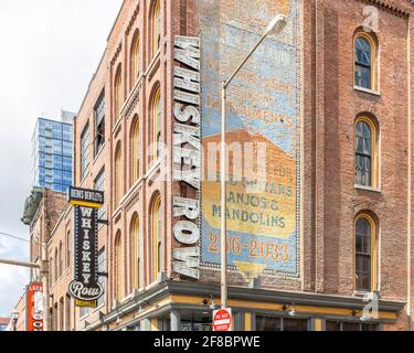 Dierks Bentley's Whiskey Row is the country music singer's club on Broadway Street in downtown Nashville with food, liquor, and multiple levels. Stock Photo