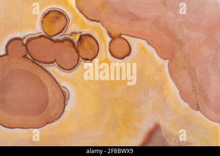 Natural Multicolor onyx in brown tone, texture in your admirable colors for new interior. Stock Photo