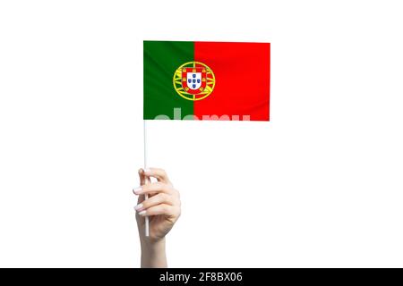Beautiful female hand holding Portugal flag, isolated on white background. Stock Photo