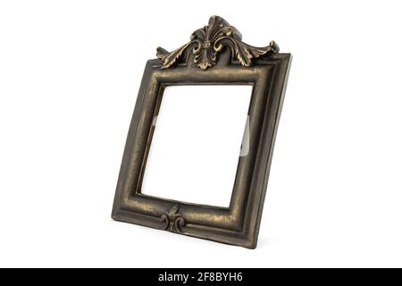 Dark golden photo frame with floral patterns, isolated on white background Stock Photo