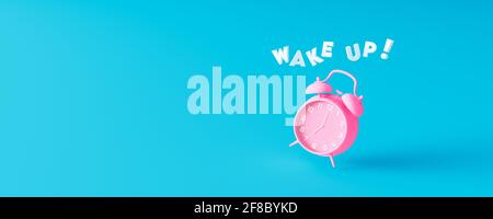 Pink alarm clock ringing with wake up text on blue background 3d render 3d illustration Stock Photo