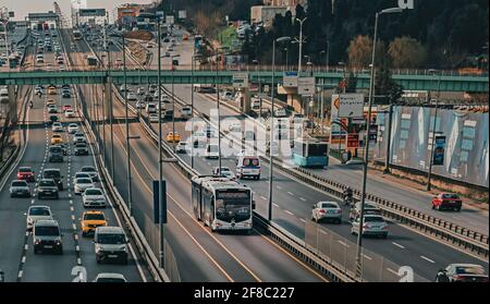 Istanbul, Turkey: March 15, 2018: Metrobus line in Istanbul in the middle of the highway. One modern bus  Stock Photo