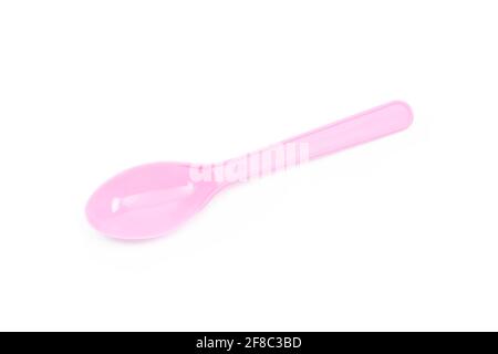 Pink plastic spoon isolated on white background Stock Photo