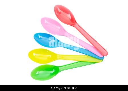 Colorful plastic spoons collection for party isolated on white Stock Photo