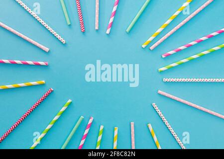Multicolored party drinking straws arrenged into a circle Stock Photo