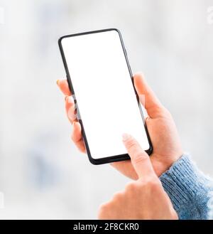 Hands working on mobile phone close up Stock Photo