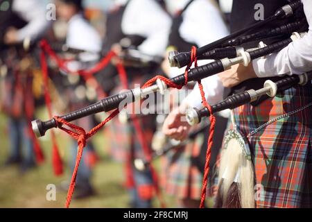 Scottish bagpipe marching band close up on bagpipes Stock Photo