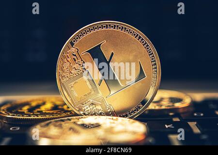 Cryptocurrency Theme. Golden Litecoin Coin Close Up. Modern Chainblock Financial Technologies. Stock Photo