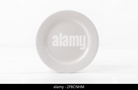 Blank white ceramic dinner dish Stock Photo