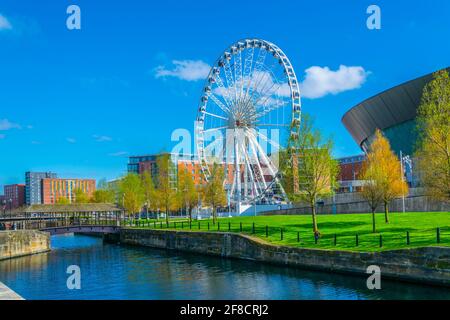 ECHO convention center and an adjacent ferris wheel in Liverpool, England Stock Photo
