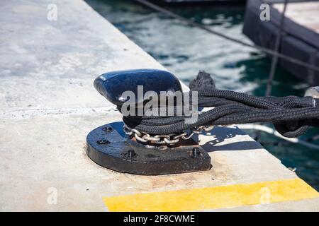 Boat Ropes on Black Mooring Bollard, Luxury Yachts Marina Pier Stock Photo  - Image of dock, pull: 215962886