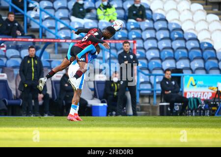 John Smith's Stadium, Huddersfield, England - 13th April 2021    Jefferson Lerma (8) of Bournemouth is on the Huddersfield players back but wins the header during the game Huddersfield v Bournemouth, Sky Bet EFL Championship 2020/21,  John Smith's Stadium, Huddersfield, England - 13th April 2021   Credit: Arthur Haigh/WhiteRosePhotos/Alamy Live News Stock Photo