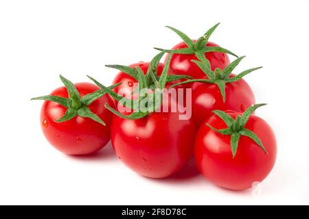 Ripe red cherry tomatoes isolated on white Stock Photo