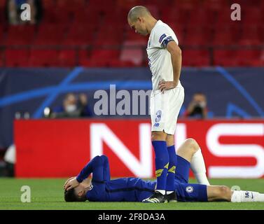 FC Porto's Kleper Pepe (right) looks over Chelsea's Kai Havertz after a tackled during the UEFA Champions League match at the Ramon Sanchez-Pizjuan Stadium, Seville. Picture date: Tuesday April 13, 2021. See PA story SOCCER Chelsea. Photo credit should read: Isabel Infantes/PA Wire. RESTRICTIONS: Editorial use only, no commercial use without prior consent from rights holder. Stock Photo