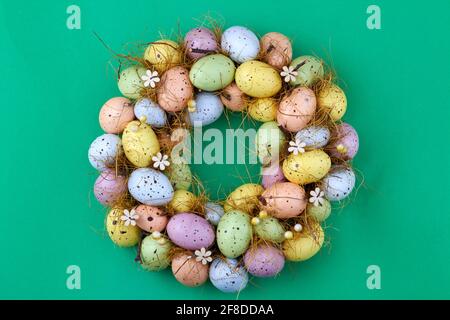 Painted motley easter eggs arranged in a circle. Stock Photo