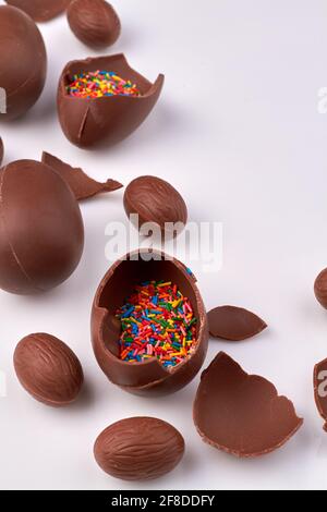 Sweet chocolate eggs with sprinkles. Stock Photo