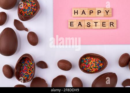 Happy easter and chocolate eggs. Stock Photo