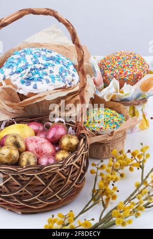 Eggs with cakes vertical shot. Stock Photo