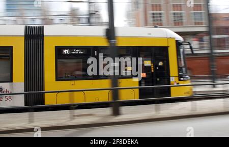 Berlin, Germany. 13th Apr, 2021. A tram of the line M10 drives on the Warschauer Brücke in the district Friedrichshain to the final stop. Credit: Wolfgang Kumm/dpa/Alamy Live News Stock Photo