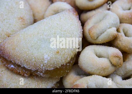 Close-up of a tray of typical Christmas sweets in Spain, sweet potato cakes or Pastissets de Boniato and sweet anise rolls Stock Photo