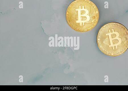 Golden Bitcoins Cryptocurrency top view stack of Digital coins on gray marble desk table background.Flat lay blank text.Copy space for word. Stock Photo