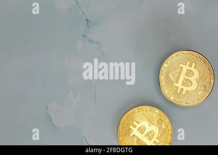 Golden Bitcoins Cryptocurrency top view stack of Digital coins on gray marble desk table background.Flat lay blank text.Copy space for word. Stock Photo