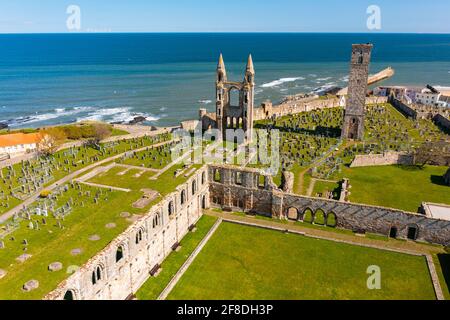 Aerial view from drone of St Andrews town and St Andrews Cathedral ruins (closed for Covid-19 lockdown), Fife, Scotland, UK and Stock Photo