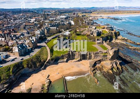 Aerial view from drone of St Andrews town and St Andrews Castle, Fife, Scotland, UK and Stock Photo