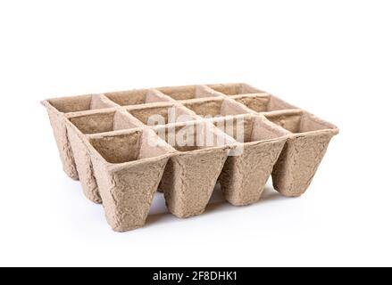 Compostable gardening, cell packs made out of peat fiber, isolated on white. Stock Photo