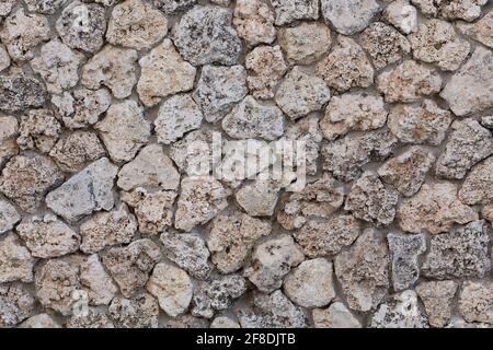 Stone wall texture of natural limestone Stock Photo