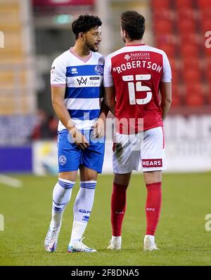 Queens Park Rangers' Macauley Bonne (left) and Rotherham United's Clark Robertson during the Sky Bet Championship match at the AESSEAL New York Stadium, Rotherham. Picture date: Tuesday April 13, 2021. Stock Photo