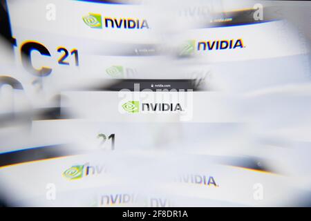 Milan, Italy - APRIL 10, 2021: NVIDIA Semiconductors logo on laptop screen seen through an optical prism. Illustrative editorial image from NVIDIA Sem Stock Photo