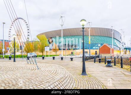 LIVERPOOL, UNITED KINGDOM, APRIL 6, 2017: ECHO convention center and an adjacent ferris wheel in Liverpool, England Stock Photo
