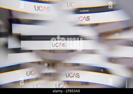 Milan, Italy - APRIL 10, 2021: Ucas logo on laptop screen seen through an optical prism. Illustrative editorial image from Ucas website. Stock Photo