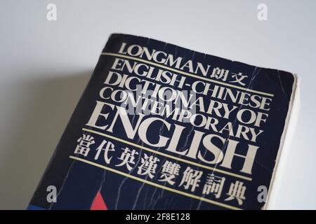 An old wornd out longman english to chinese dictionary Stock Photo