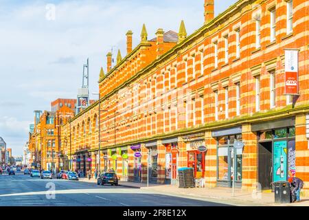 MANCHESTER, UNITED KINGDOM, APRIL 11, 2017: View of the classical brick houses on Deansgate street in Manchester, England Stock Photo