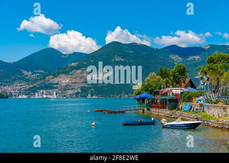 LAKE ISEO, ITALY, JULY 16, 2019: Villages spread alongside lake Iseo in Italy Stock Photo