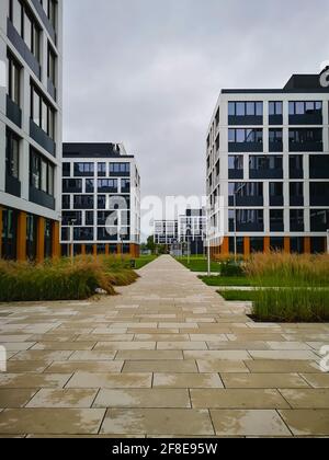 Wroclaw, Poland - June 20 2020: Business garden square of black and white corporate buildings Stock Photo