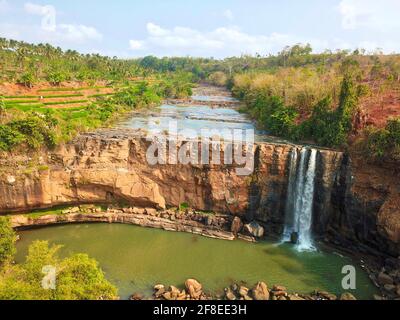 Awang waterfall is located in Taman Jaya Village, which is one of waterfalls at Ciletuh River stream. Awang waterfall has a height of about 40 meters Stock Photo