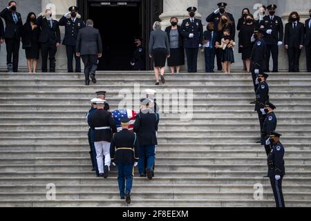 (210414) -- WASHINGTON, April 14, 2021 (Xinhua) -- A casket containing the remains of the slain U.S. Capitol Police officer William Evans arrives at the Capitol in Washington, DC, April 13, 2021. William 'Billy' Evans, the 18-year Capitol Police officer killed while in the line of duty when a car rammed into him and another officer, lay in honor in the Capitol Rotunda on Tuesday. (Shawn Thew/Pool via Xinhua) Stock Photo