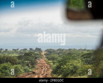 Tanzania, Africa - February 27, 2020: Dirt offroad as you enter Tanzania from Kenya Stock Photo