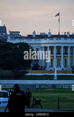 (210414) -- WASHINGTON, April 14, 2021 (Xinhua) -- Photo taken on April 13, 2021 shows the White House in Washington, DC, the United States. President Joe Biden will announce the withdrawal of U.S. troops from Afghanistan by Sept. 11 on Wednesday, multiple U.S. media outlets reported on Tuesday. The decision would extend U.S. military presence in Afghanistan past a May 1 deadline set in a deal between the previous administration and the Afghan Taliban. White House Press Secretary Jen Psaki told reporters at a daily briefing that Biden is expected to make a formal announcement of the dec Stock Photo