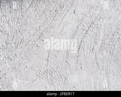 light gray concrete wall rough background. texture with grainy detail Stock Photo