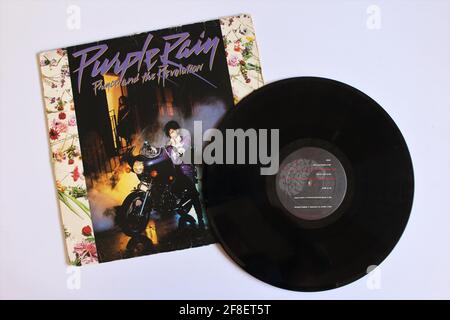 Rock, pop, Rnb and psychedelic artist, Prince and the Revolution music album on vinyl record LP disc. Titled: Purple Rain Stock Photo