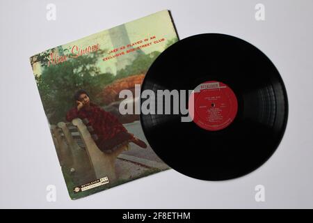 Jazz  artist, Nina Simone music album on vinyl record LP disc. Titled: Little Girl Blue and also was called Jazz as Played in an Exclusive Side Street Stock Photo