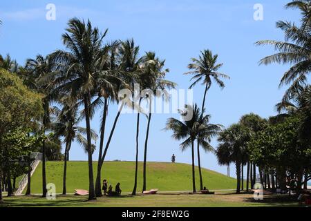 Blurred out faces. Tourists, families and spring breakers at South Pointe Park beach promenade area in Miami Beach, Florida. Stock Photo