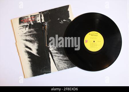 English rock band, The Rolling Stones music album on vinyl record LP disc. Titled: Sticky Fingers Stock Photo