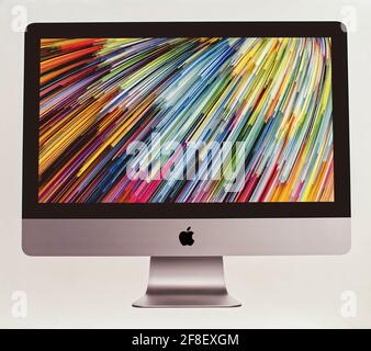 New iMac 21,5 inch personal computer made by Apple Computers, isolated on white background. Front view Stock Photo